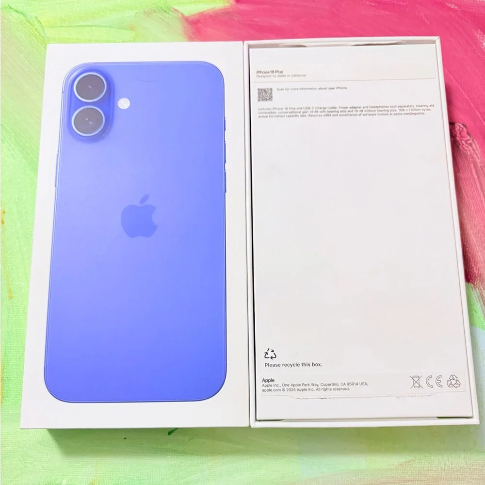 Two empty iPhone 16 plus boxes. Brand new. Colors are blue and pink.